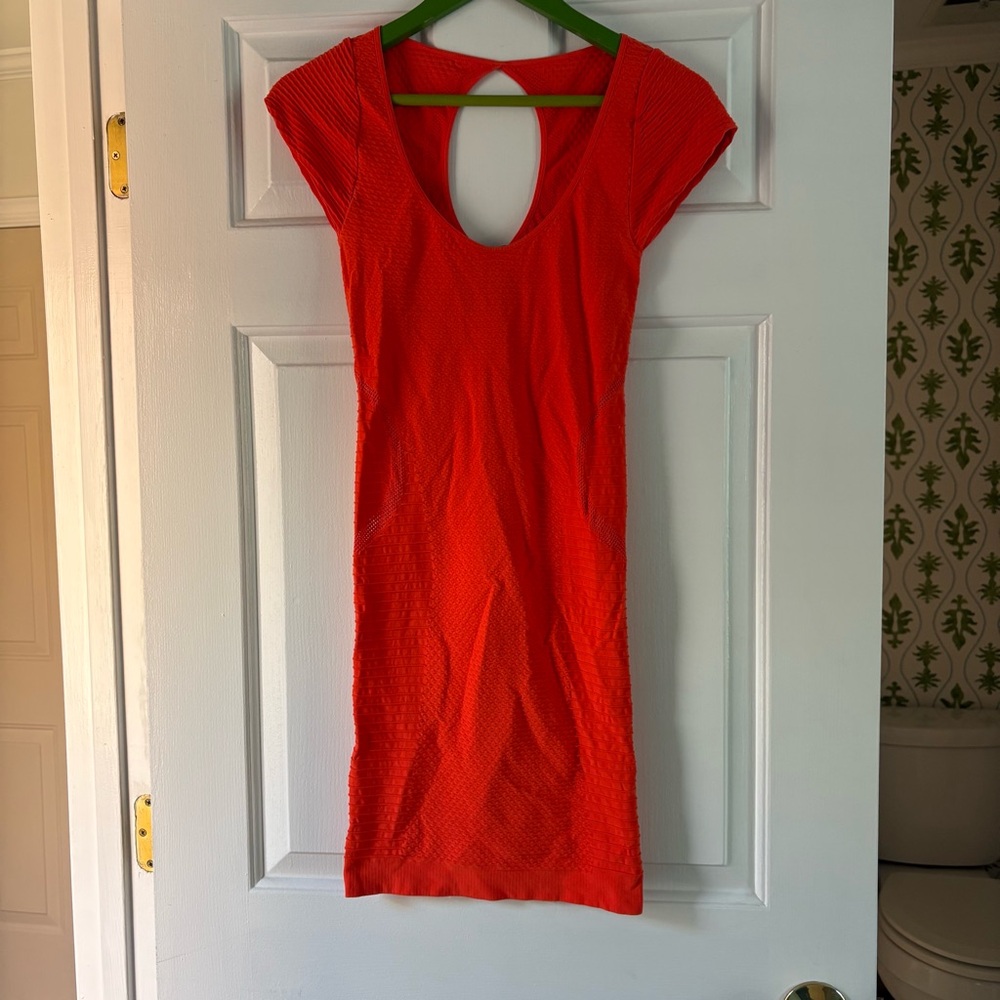 Orange stretchy bodycon BeBe dress size small